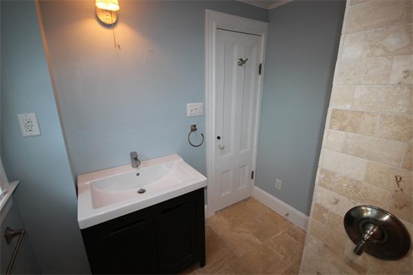 129 Turner Road Scituate, MA 02066 - Photo 6 of 15 a bathroom with a sink and a mirror