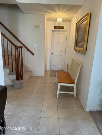 a view of hallway with washer and dryer