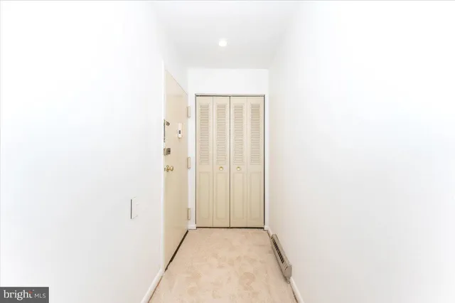a kitchen with stainless steel appliances granite countertop a stove and a refrigerator