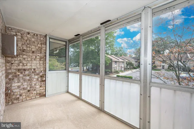 a kitchen with stainless steel appliances granite countertop a sink a stove a refrigerator and a microwave