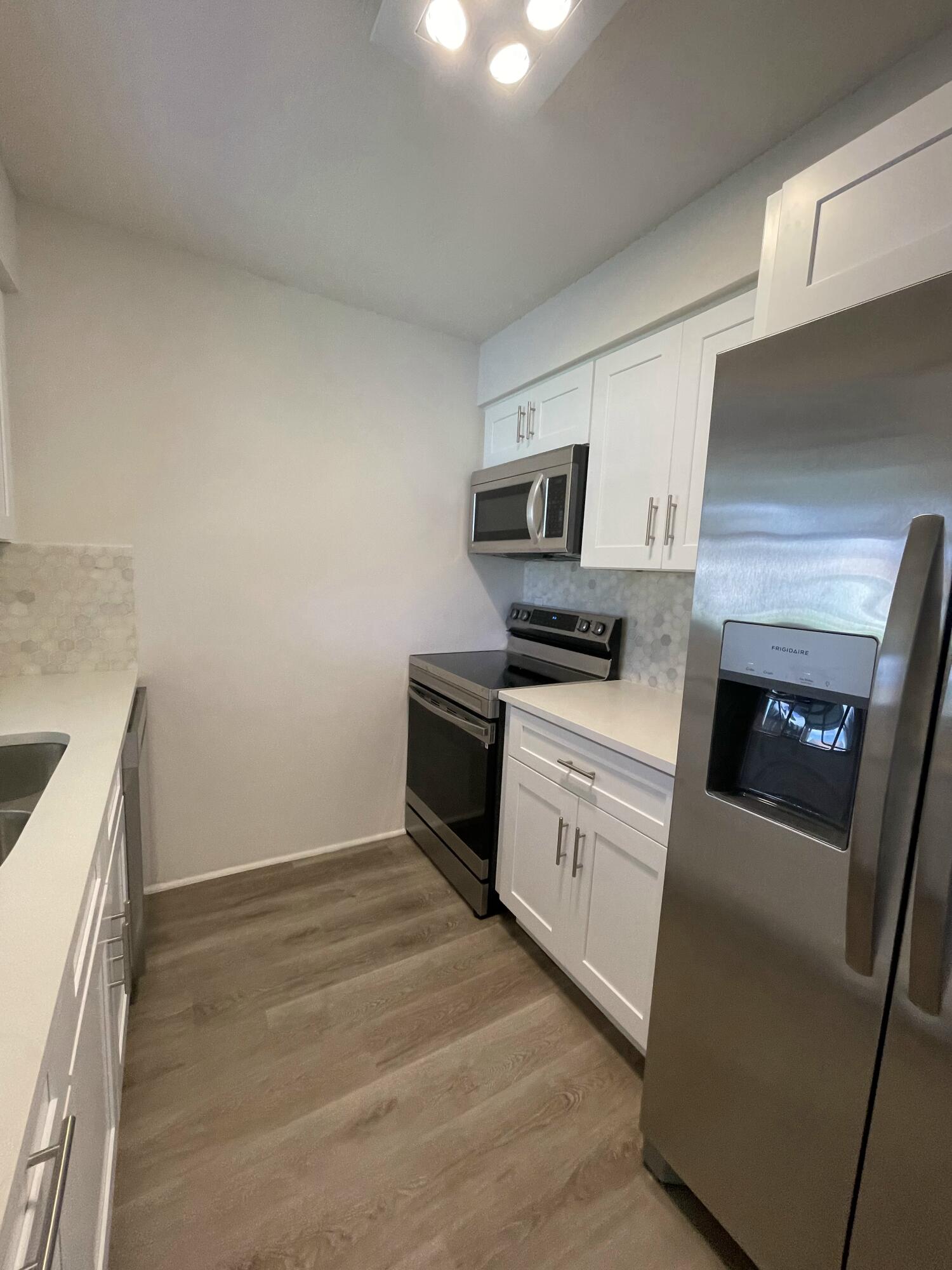 4303 Inlet Circle Greenacres, FL 33463 - Photo 3 of 24 9689363A-0640-46CE-8221-4B8C61A16214