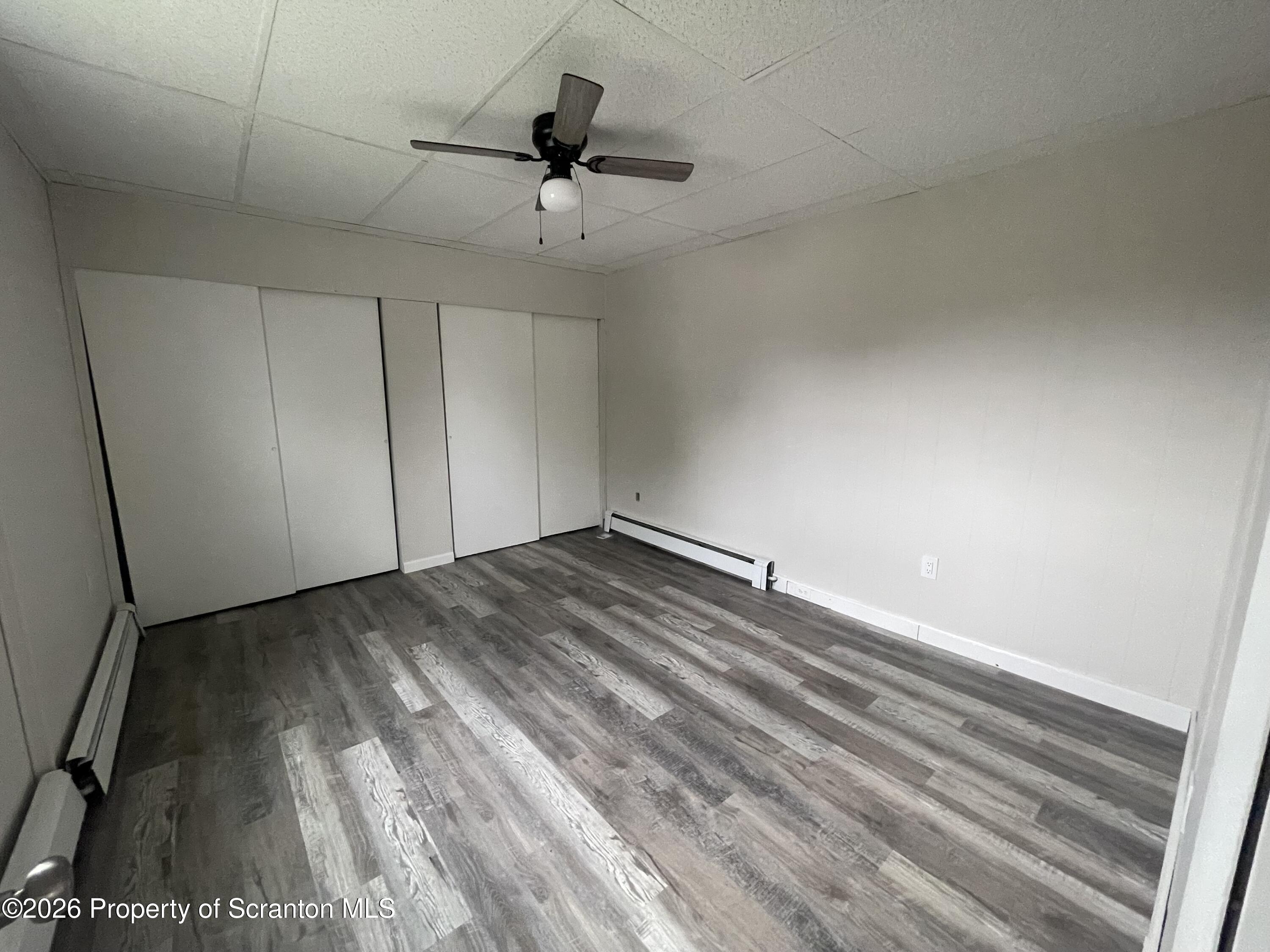 238 George Street Moosic, PA 18507 - Photo 16 of 23 a view of empty room with ceiling fan