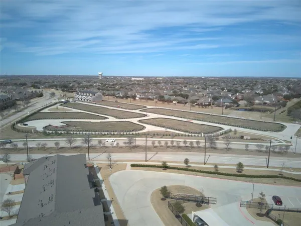 a view of a room with a kitchen