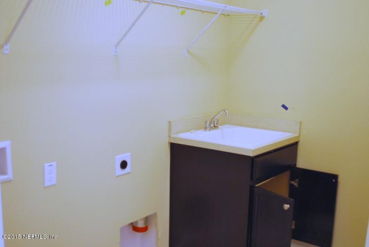 15925 Tisons Bluff Road, Unit 615 Jacksonville, FL 32218 - Photo 12 of 17 YBL 615 Ermont Laundry
