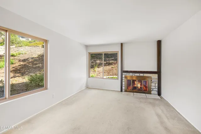 a kitchen that has a sink and a stove
