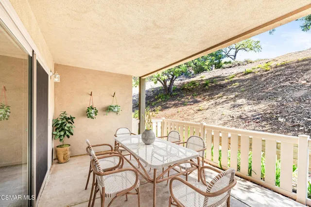 a view of a lake with a tree