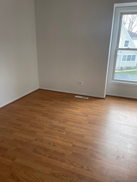 1302 Inverrary Lane, Unit 1302 Deerfield, IL 60015 - Photo 10 of 20 a view of an empty room and a window