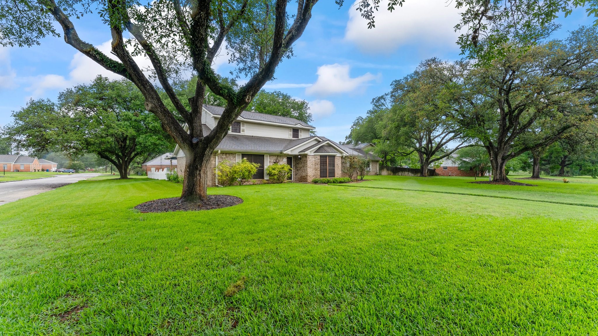 a house with garden in front of it