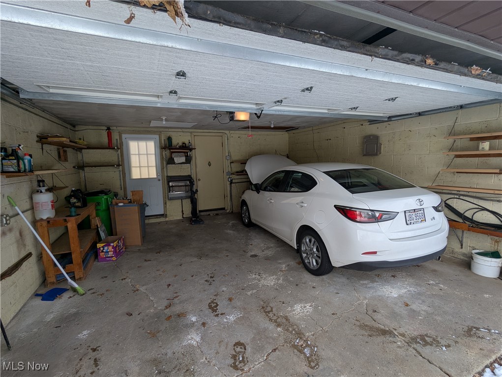 815 East Schaaf Road Independence, OH 44131 - Photo 30 of 36 Garage with a garage door opener