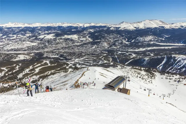 a view of a ocean with a mountain