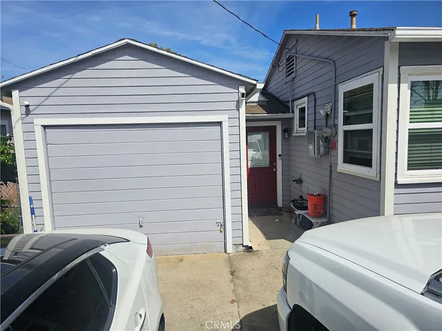 a front view of a house with a garage