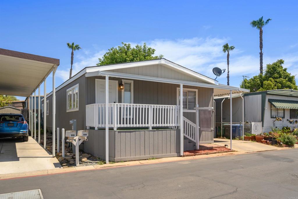 a view of a house with a fence