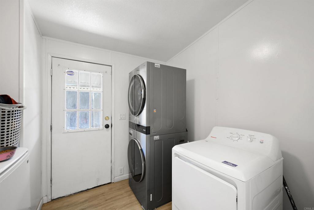 400 Greenfield Drive El Cajon, CA 92021 - Photo 28 of 41 a utility room with dryer and washer