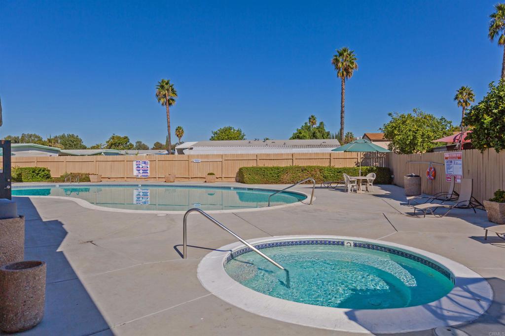 400 Greenfield Drive El Cajon, CA 92021 - Photo 36 of 41 a view of a swimming pool with a yard