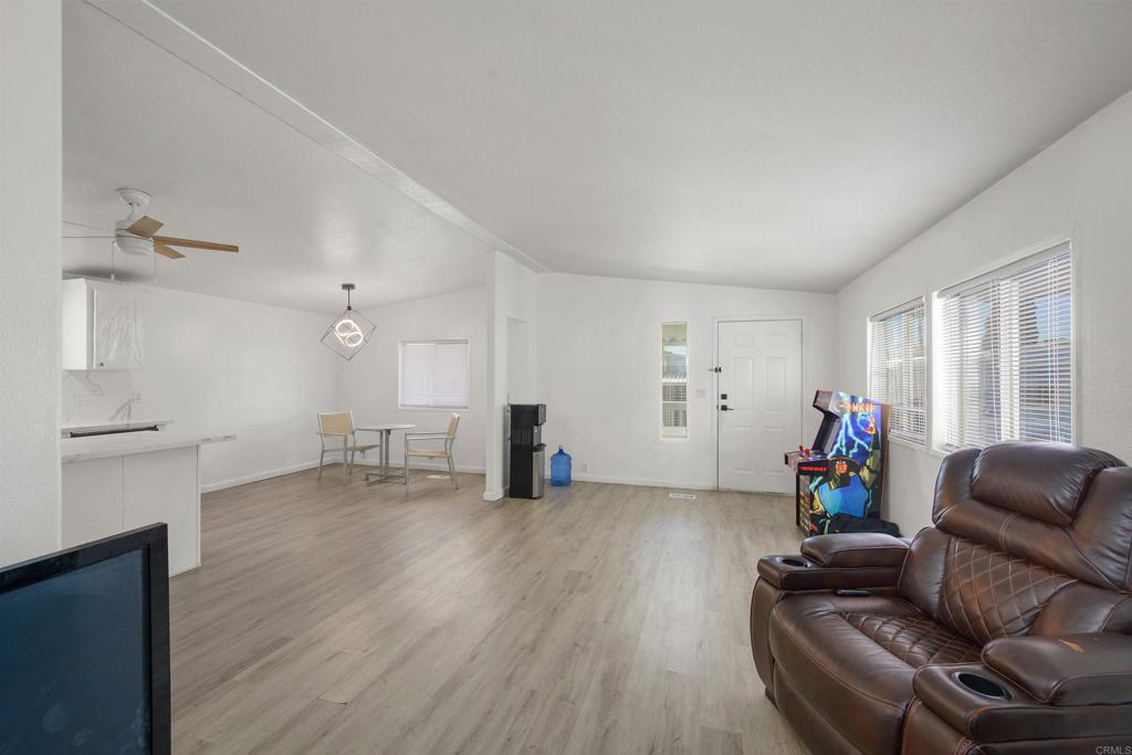 400 Greenfield Drive El Cajon, CA 92021 - Photo 8 of 41 a living room with furniture and a wooden floor