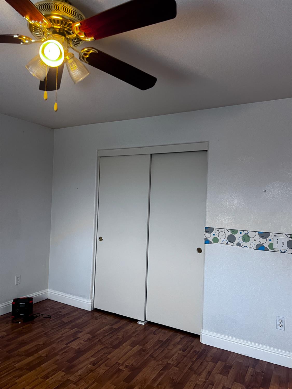 1950 West Rio Hondo Way Hanford, CA 93230 - Photo 34 of 56 a view of an empty room with wooden floor