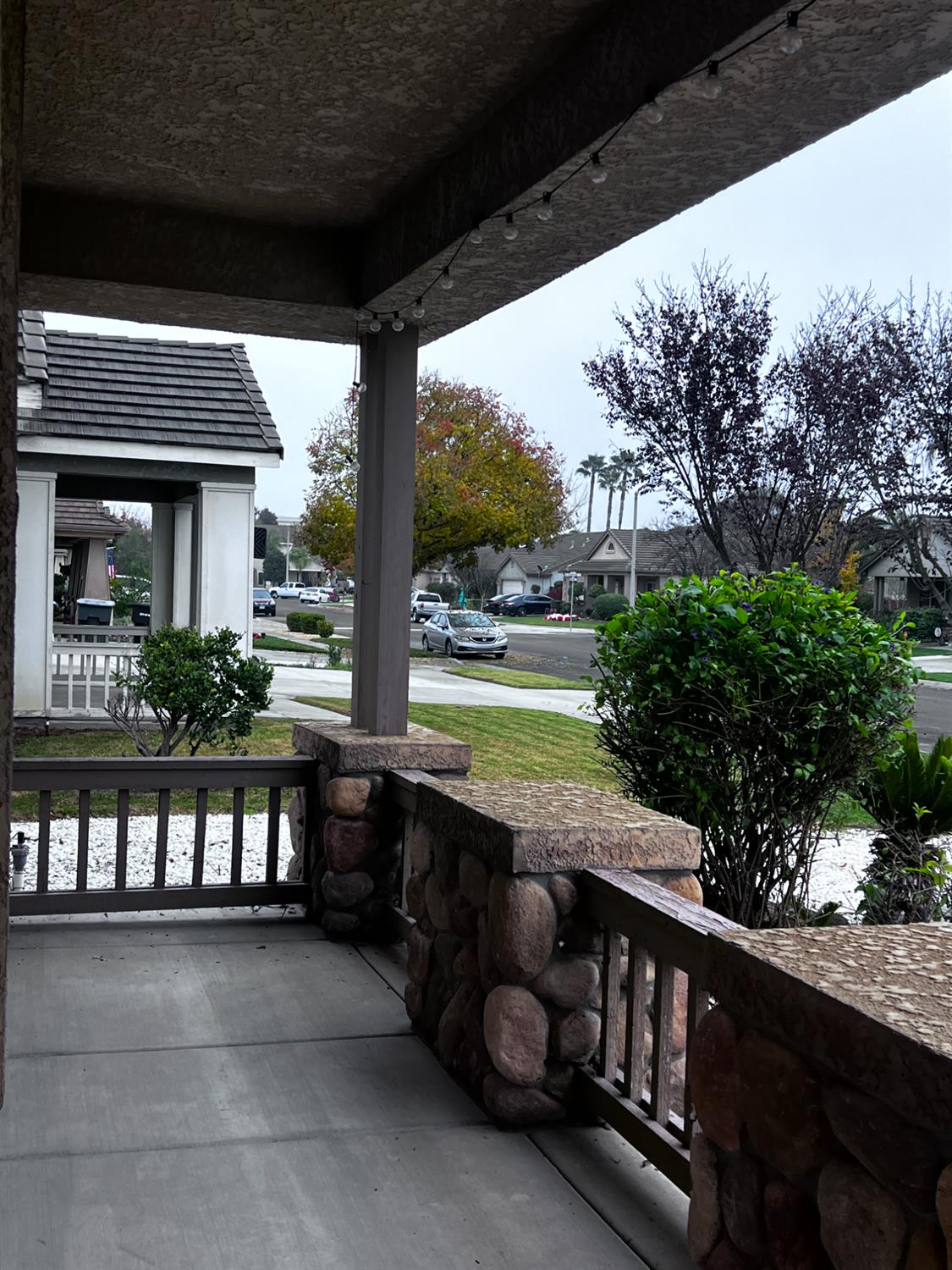 1950 West Rio Hondo Way Hanford, CA 93230 - Photo 49 of 56 a view of a patio with a table chairs and a backyard