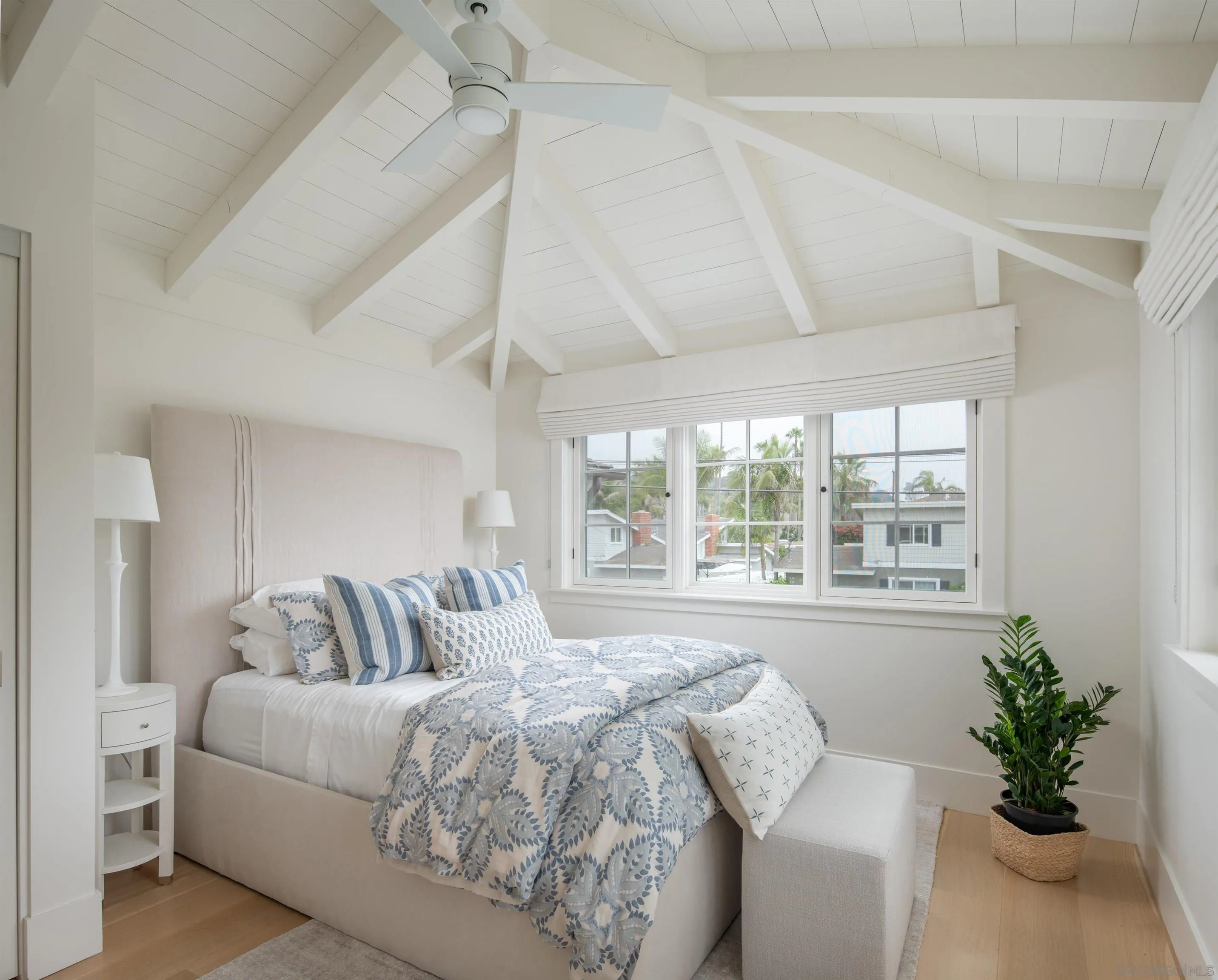 236 24th Street Del Mar, CA 92014 - Photo 23 of 34 a bedroom with a bed and a couch