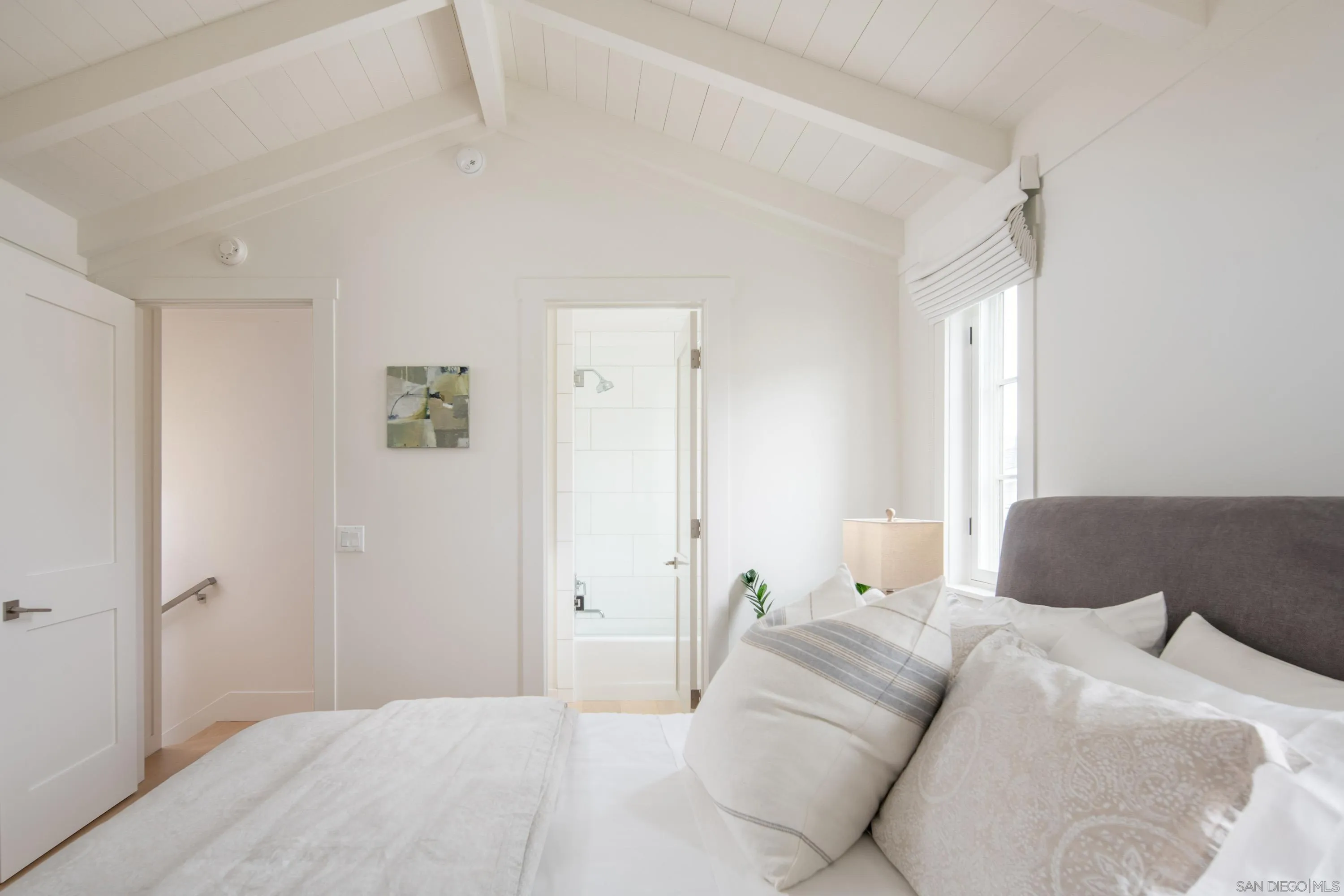 236 24th Street Del Mar, CA 92014 - Photo 26 of 34 a bedroom with a bed and a couch