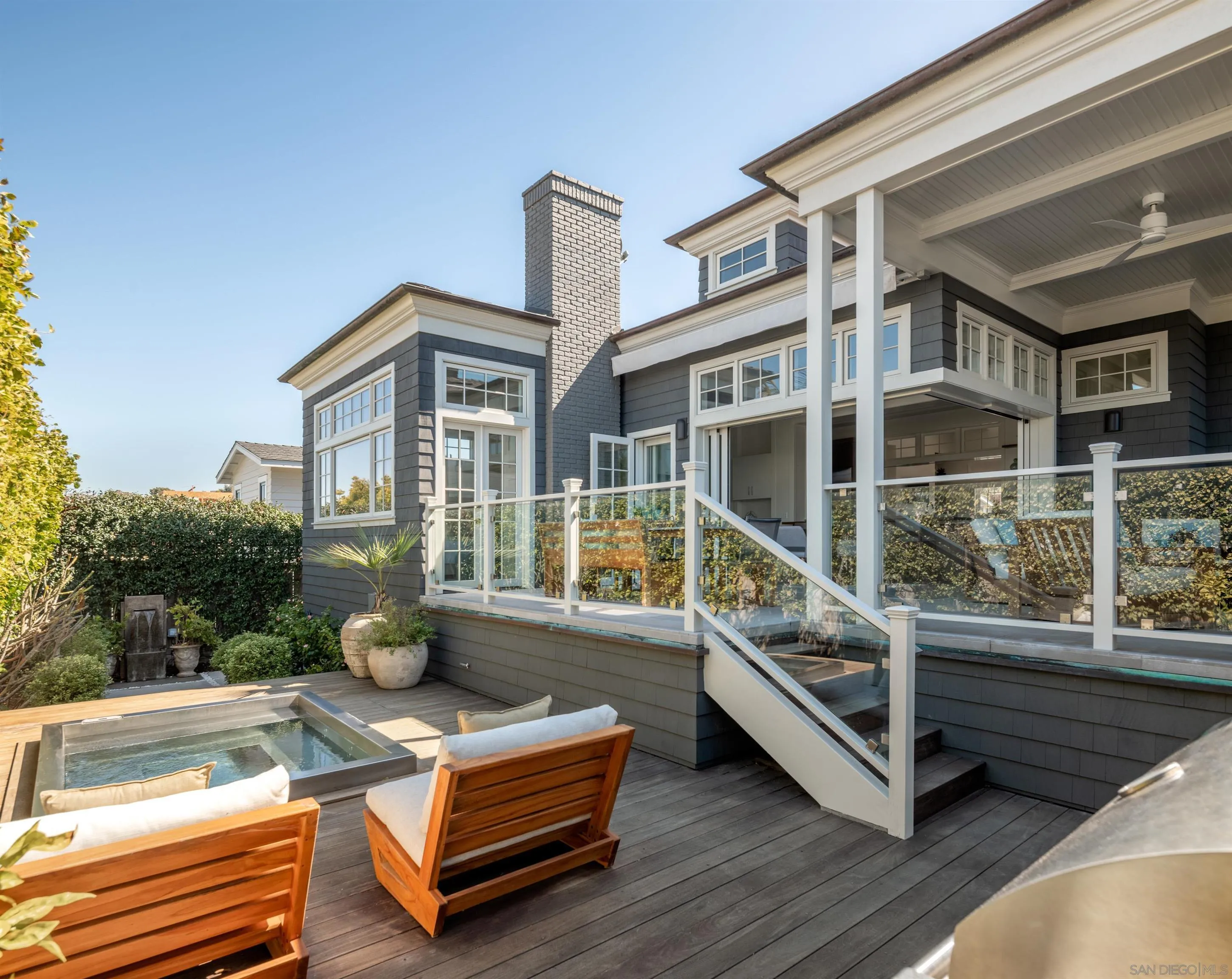 236 24th Street Del Mar, CA 92014 - Photo 5 of 34 a view of roof deck with couch and wooden floor