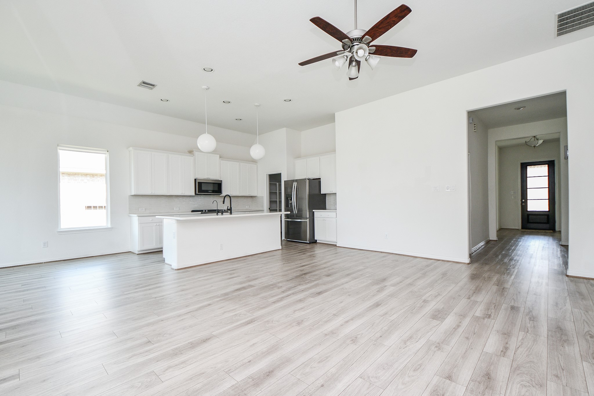 8215 Longear Lane Rosenberg, TX 77469 - Photo 13 of 23 Kitchen is open into the Family Room