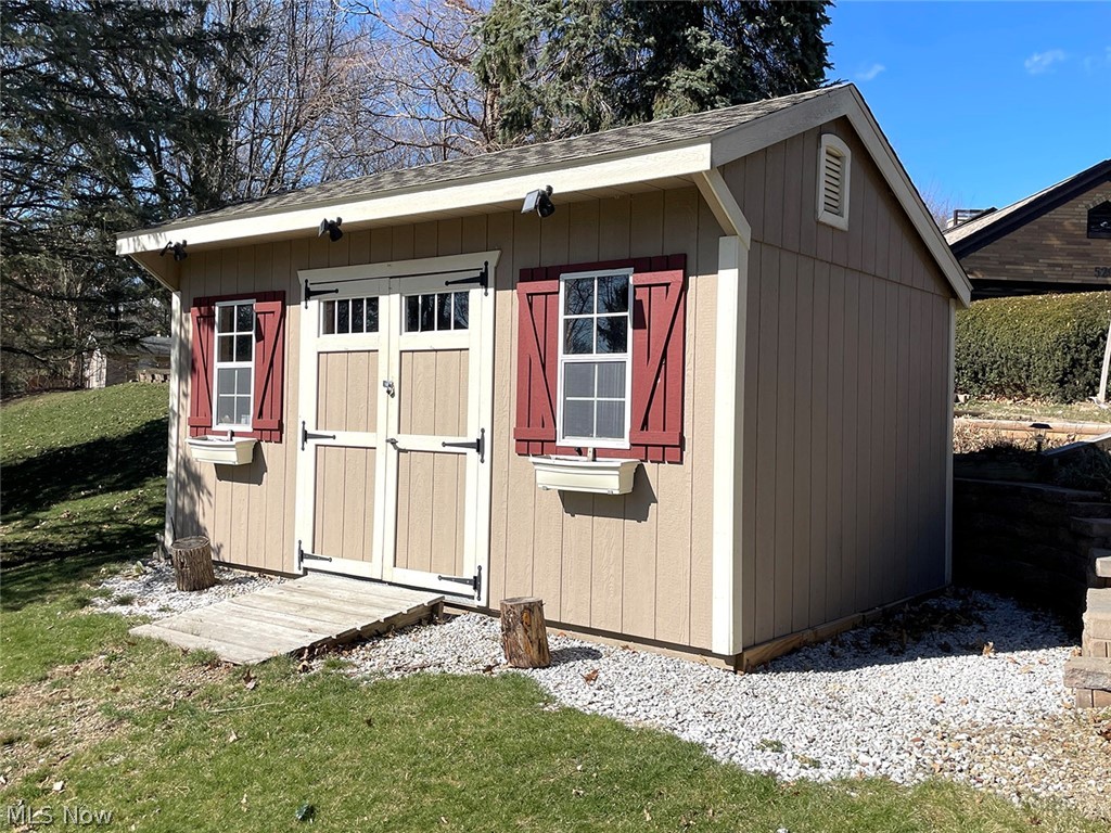 526 Ridgeleigh Street Minerva, OH 44657 - Photo 6 of 28 View of outdoor structure with a lawn