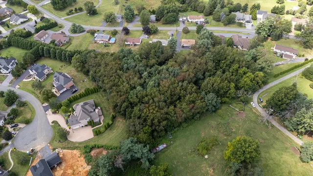 an aerial view of residential house with outdoor space