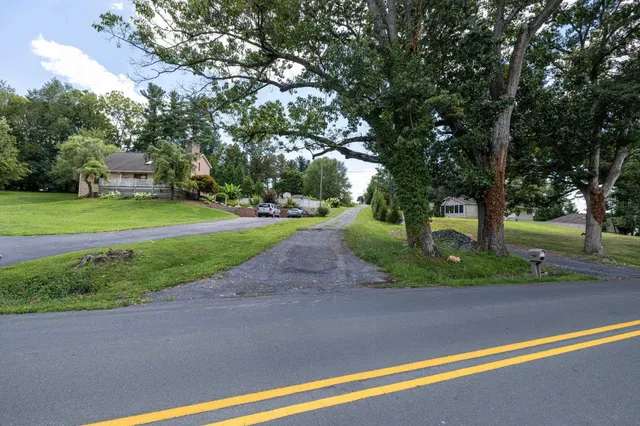 a view of a golf course with a big yard