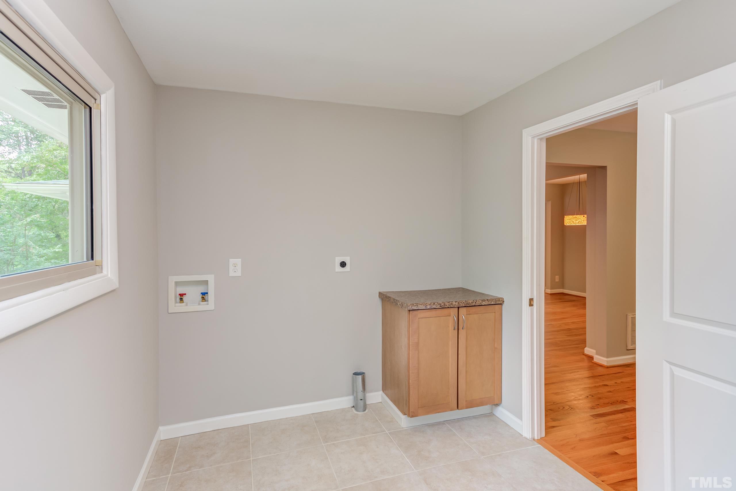 912 Winona Road Raleigh, NC 27609 - Photo 15 of 30 an empty room with windows