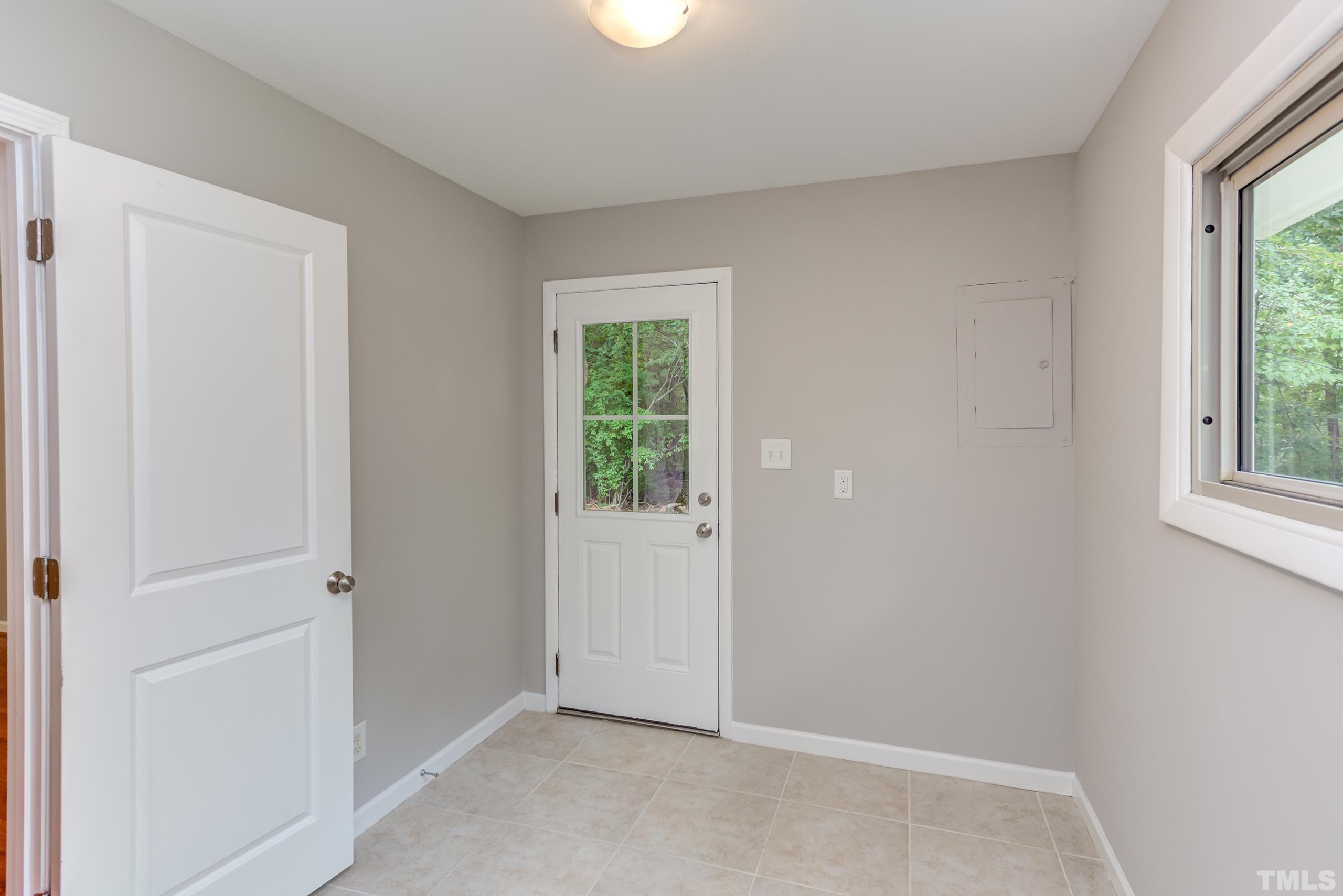 912 Winona Road Raleigh, NC 27609 - Photo 16 of 30 an empty room with windows