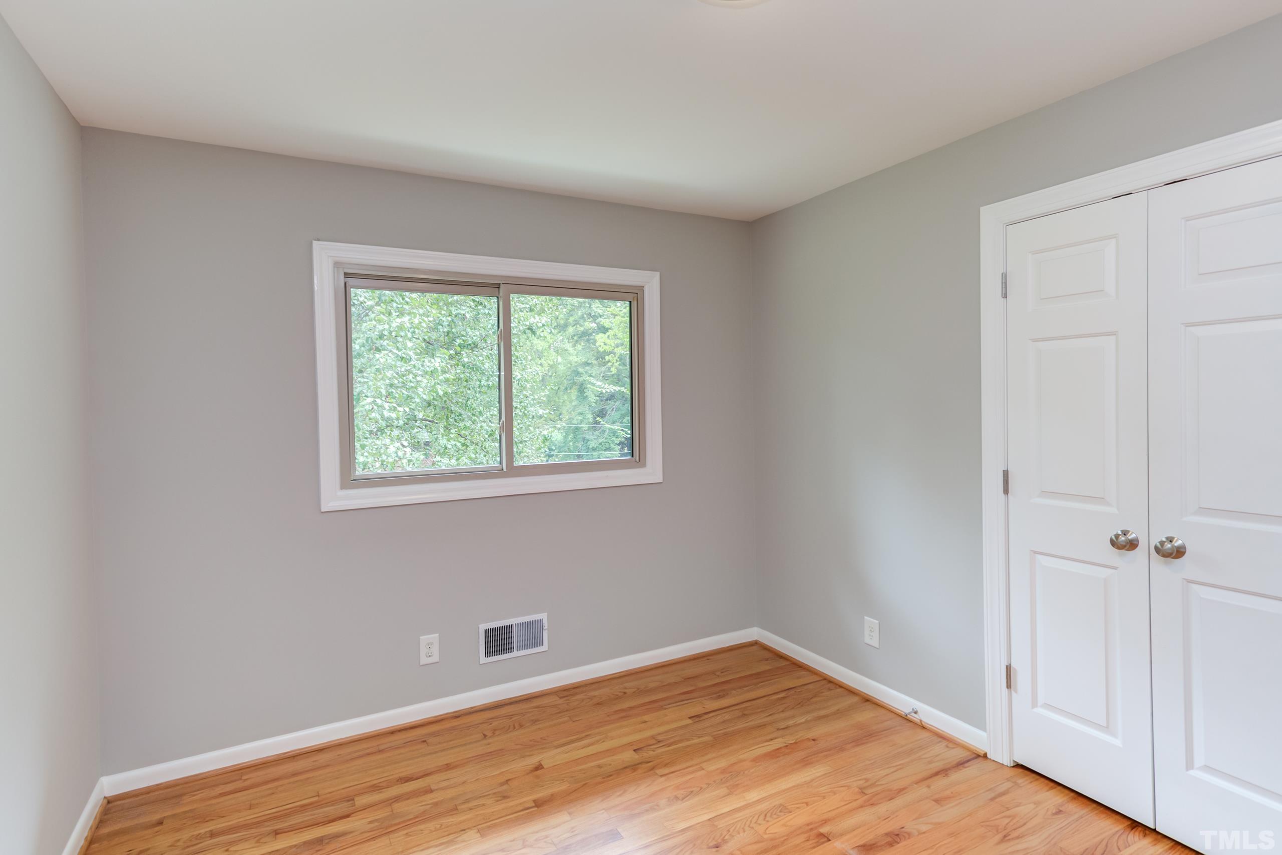 912 Winona Road Raleigh, NC 27609 - Photo 18 of 30 an empty room with a window