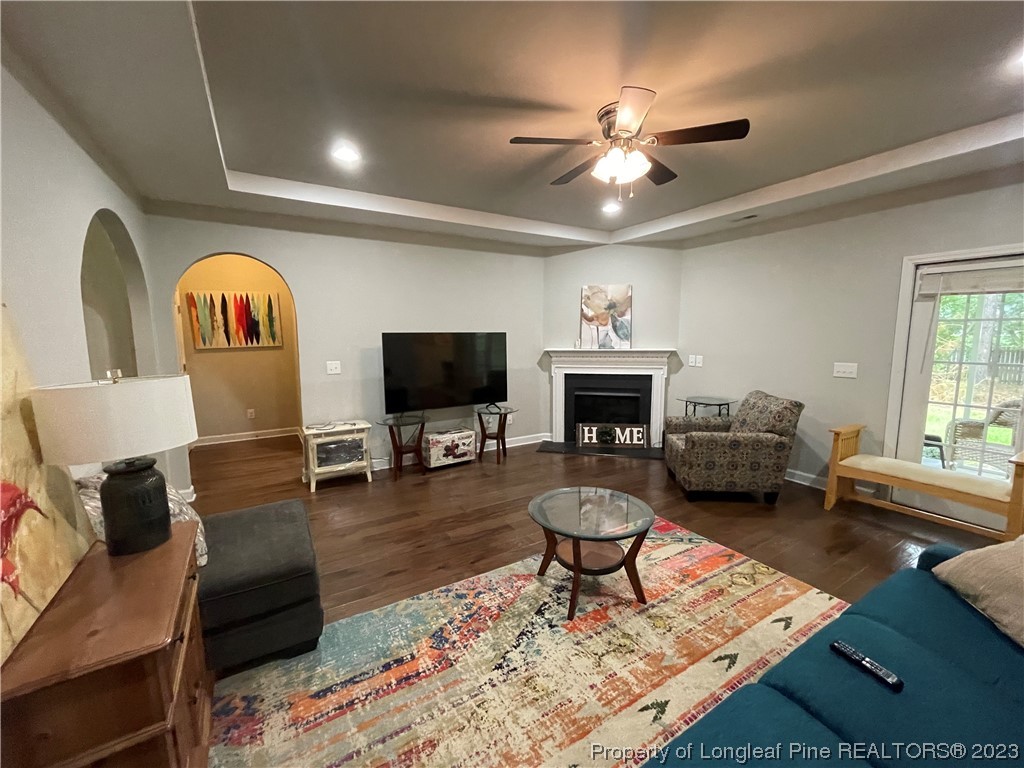 6298 Phillipi Church Road Raeford, NC 28376 - Photo 11 of 31 a living room with furniture and a flat screen tv