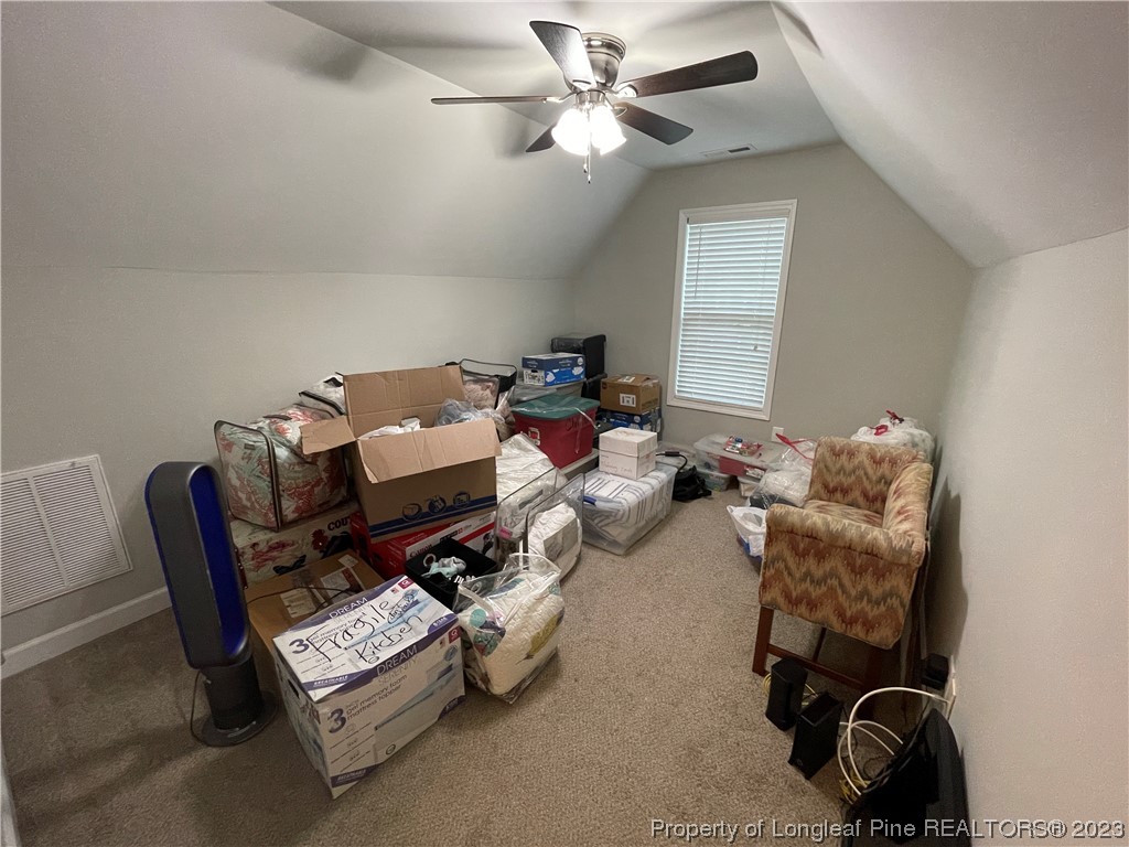 6298 Phillipi Church Road Raeford, NC 28376 - Photo 27 of 31 a living room with furniture and a window