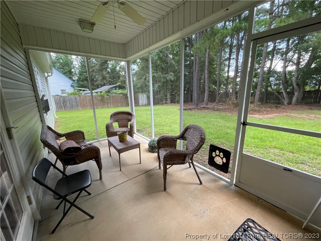 6298 Phillipi Church Road Raeford, NC 28376 - Photo 28 of 31 a house view with a sitting space and garden
