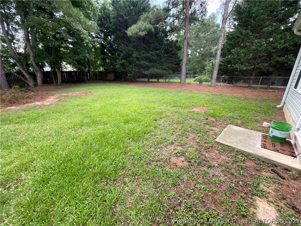 6298 Phillipi Church Road Raeford, NC 28376 - Photo 29 of 31 a view of a backyard with a garden