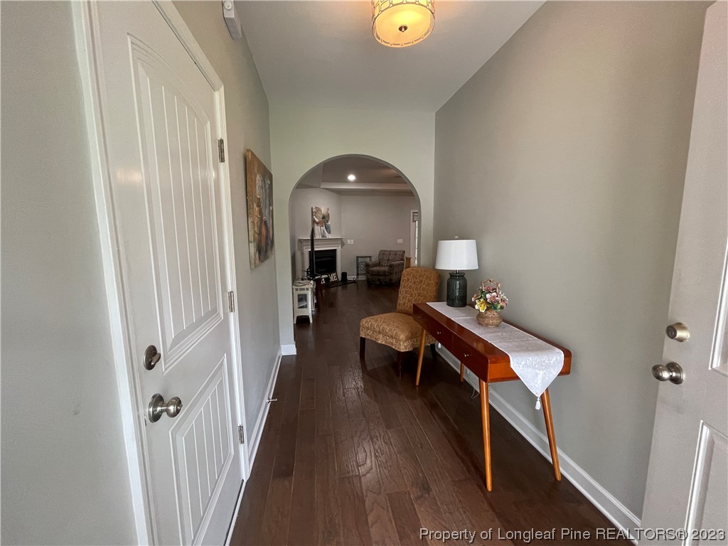 6298 Phillipi Church Road Raeford, NC 28376 - Photo 3 of 31 a living room with furniture and a wooden floor