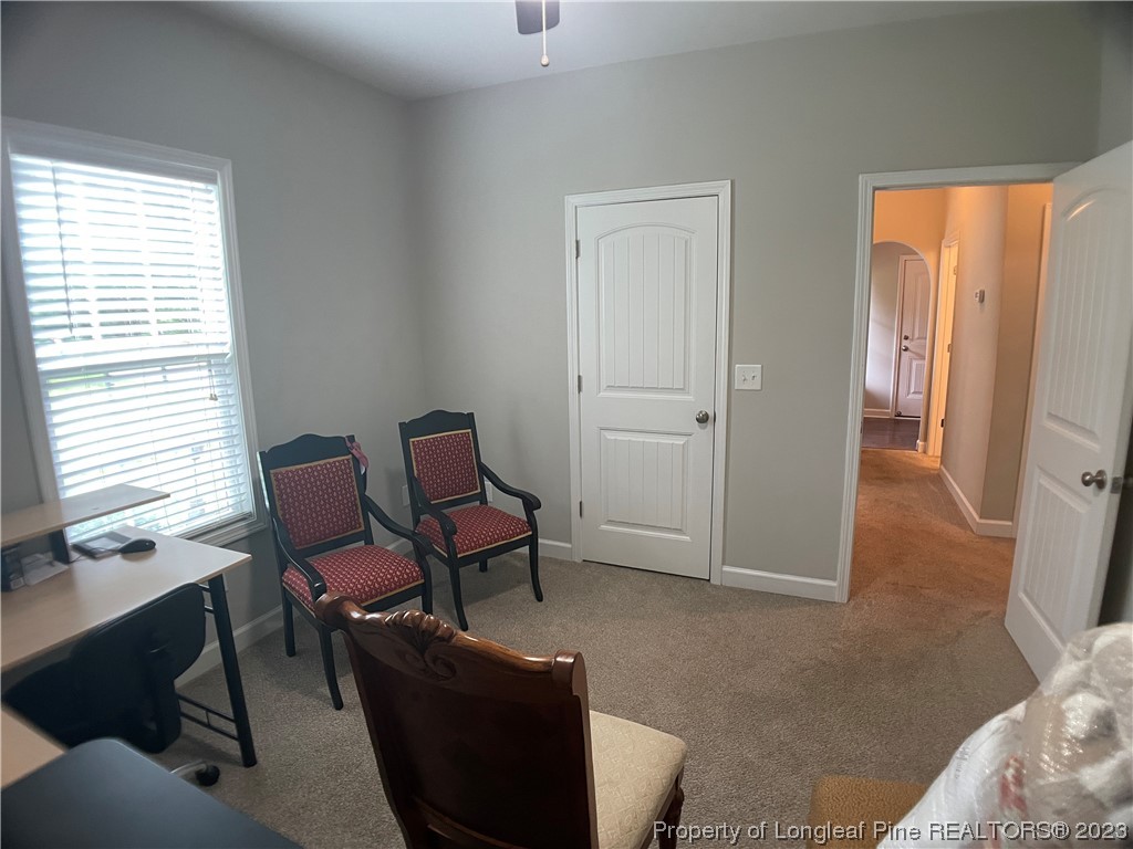 6298 Phillipi Church Road Raeford, NC 28376 - Photo 7 of 31 a view of a livingroom with furniture and windows