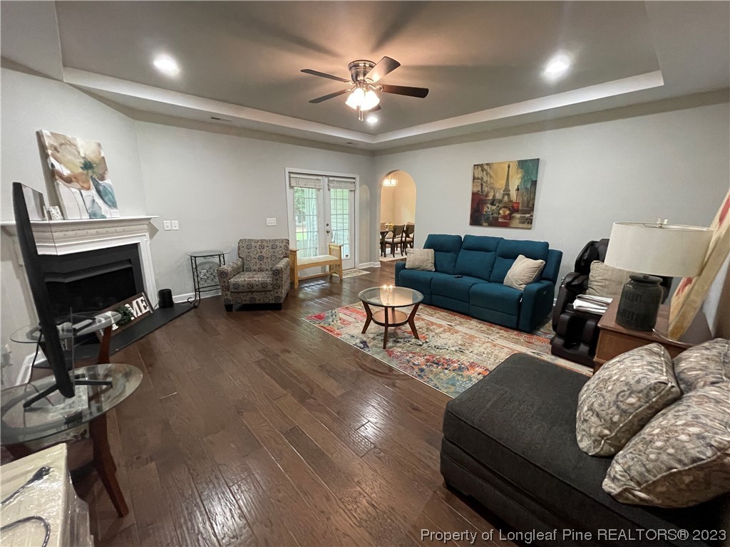6298 Phillipi Church Road Raeford, NC 28376 - Photo 10 of 31 a living room with furniture and a fireplace