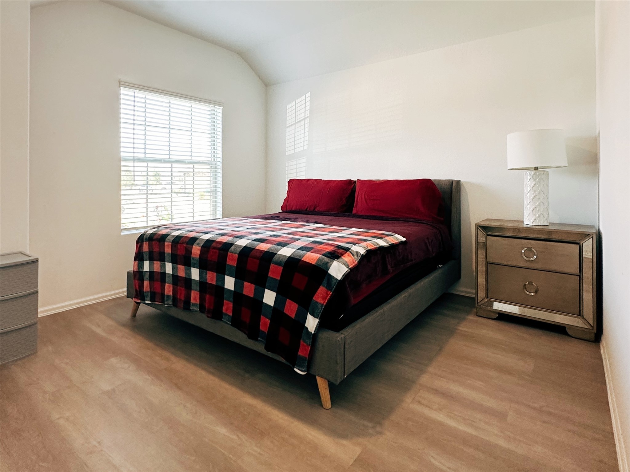 5335 Winding Strm Drive Rosenberg, TX 77469 - Photo 23 of 26 a bed sitting in a bedroom next to a window