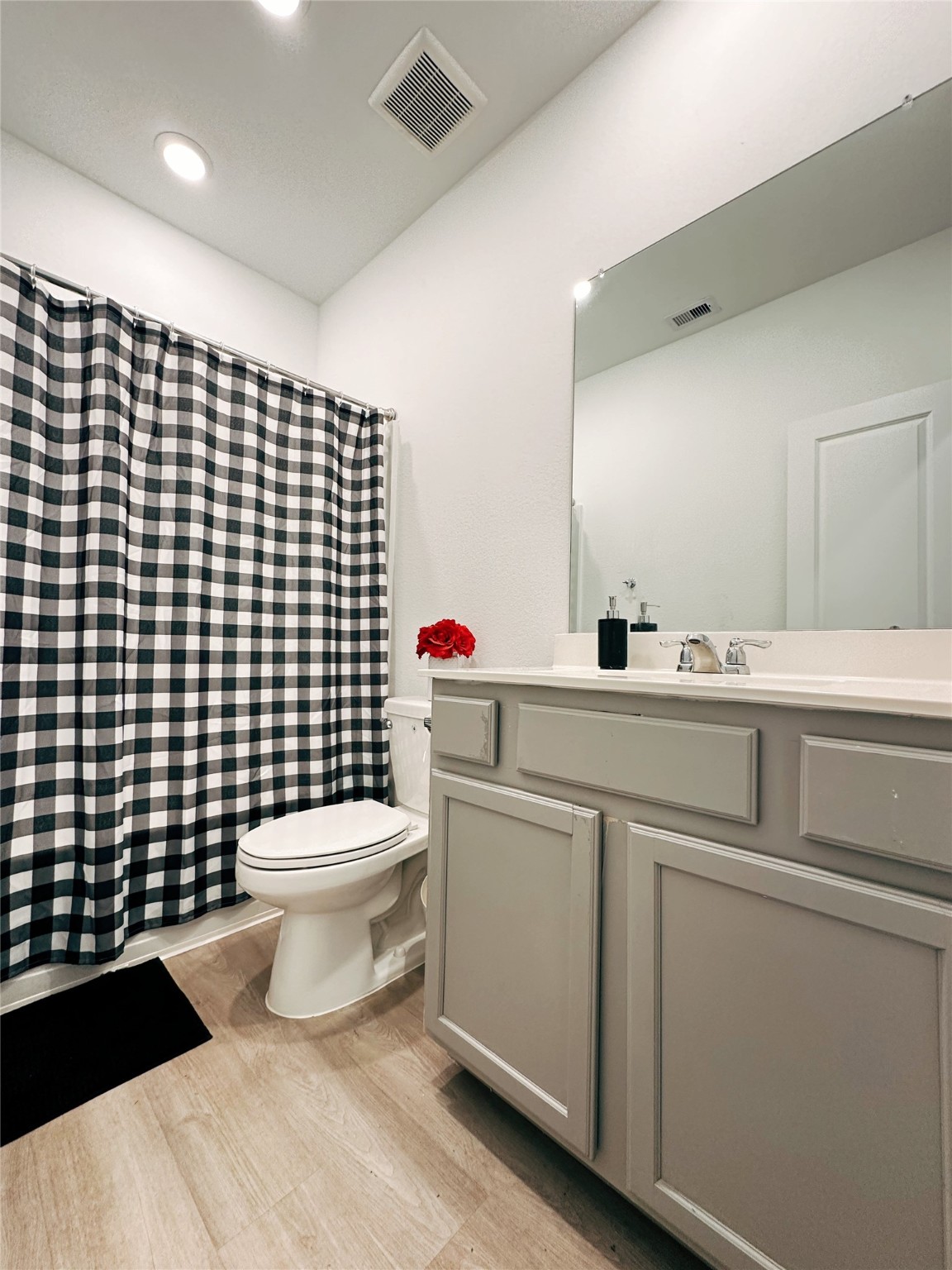 5335 Winding Strm Drive Rosenberg, TX 77469 - Photo 24 of 26 a bathroom with a toilet a sink and a shower