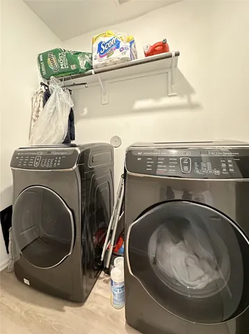 a utility room with washing machine