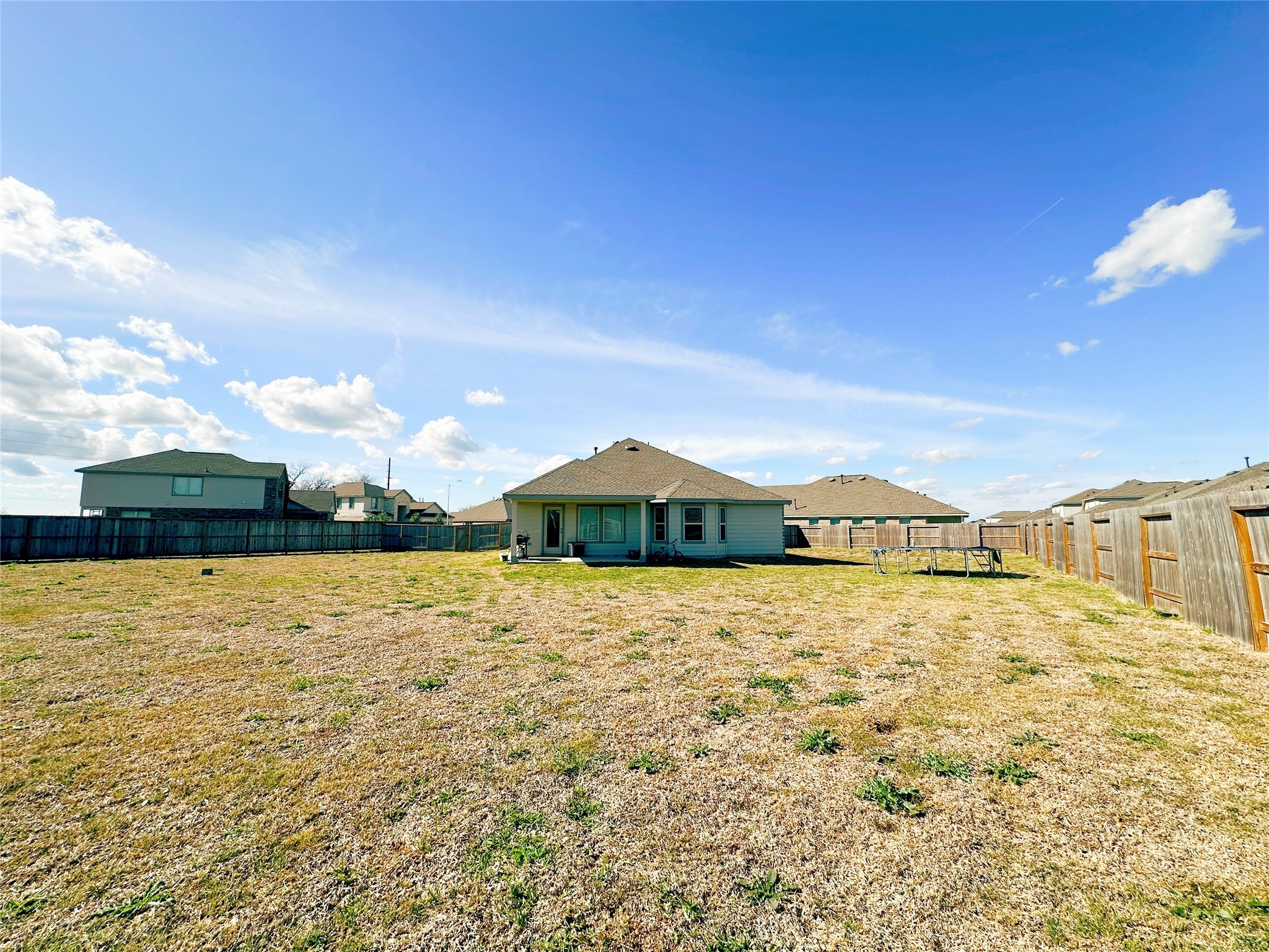 5335 Winding Strm Drive Rosenberg, TX 77469 - Photo 26 of 26 a large room with an ocean view