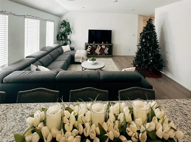 a bedroom with a bed and a couch