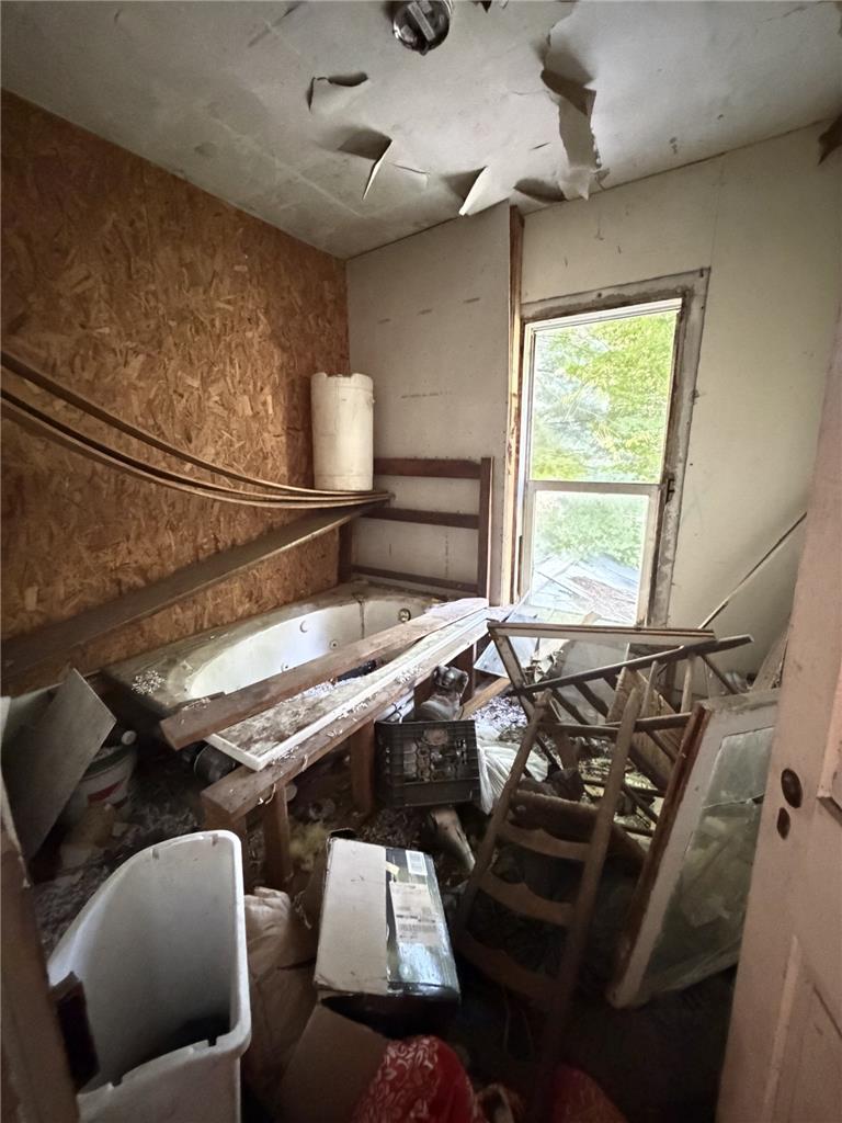 730 Ridge Road Shickshinny, PA 18655 - Photo 39 of 44 A window in an interior room of a home, revealing an outdoor view.