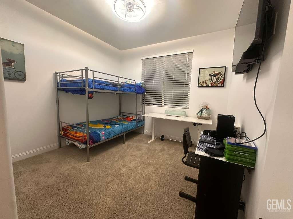 Undisclosed Address Shafter, CA 93263 - Photo 13 of 25 a bedroom with bed and a window