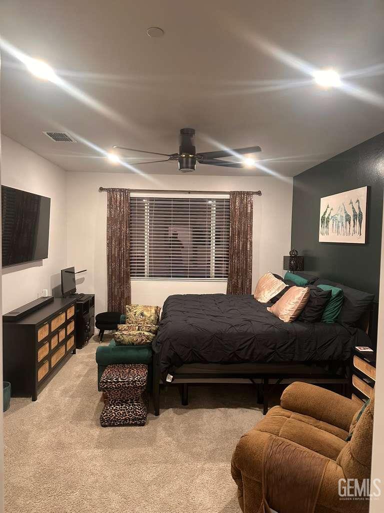 Undisclosed Address Shafter, CA 93263 - Photo 14 of 25 a living room with furniture and a flat screen tv