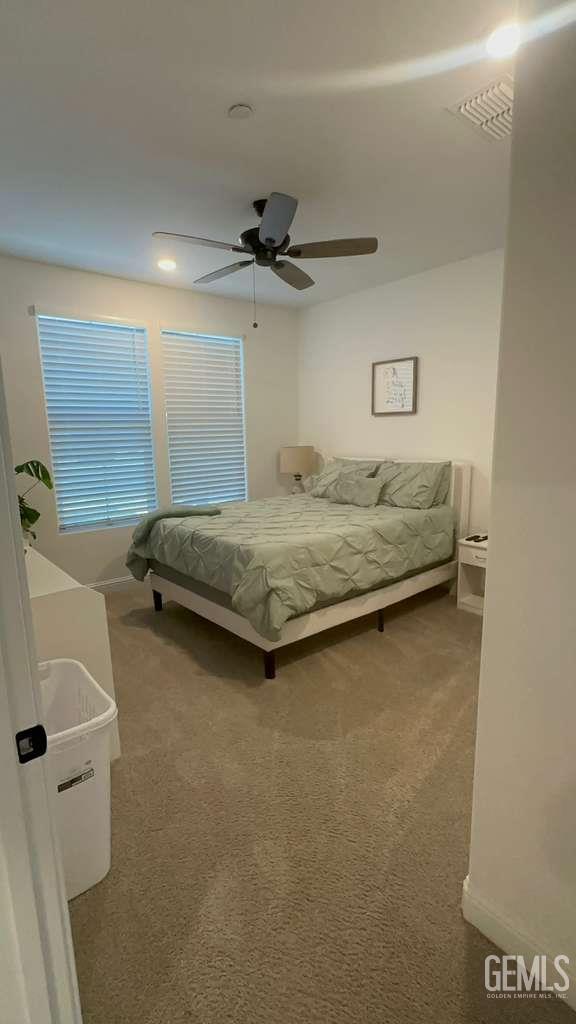 Undisclosed Address Shafter, CA 93263 - Photo 16 of 25 a bedroom with a bed and a sink