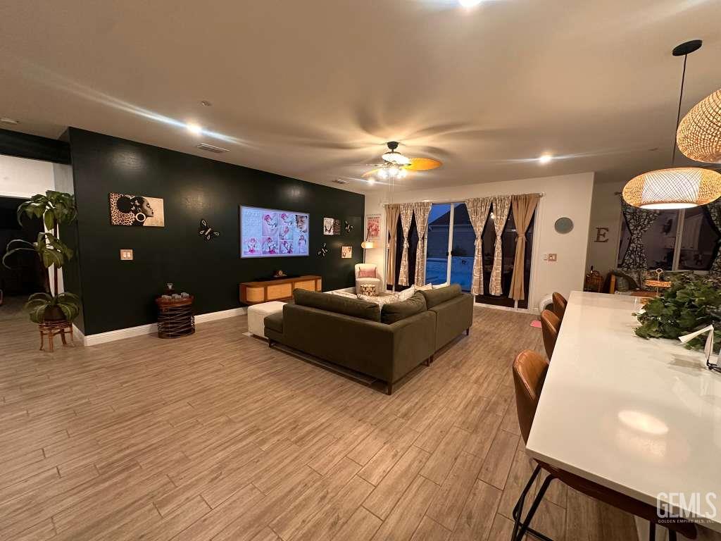 Undisclosed Address Shafter, CA 93263 - Photo 6 of 25 a living room with furniture and a flat screen tv