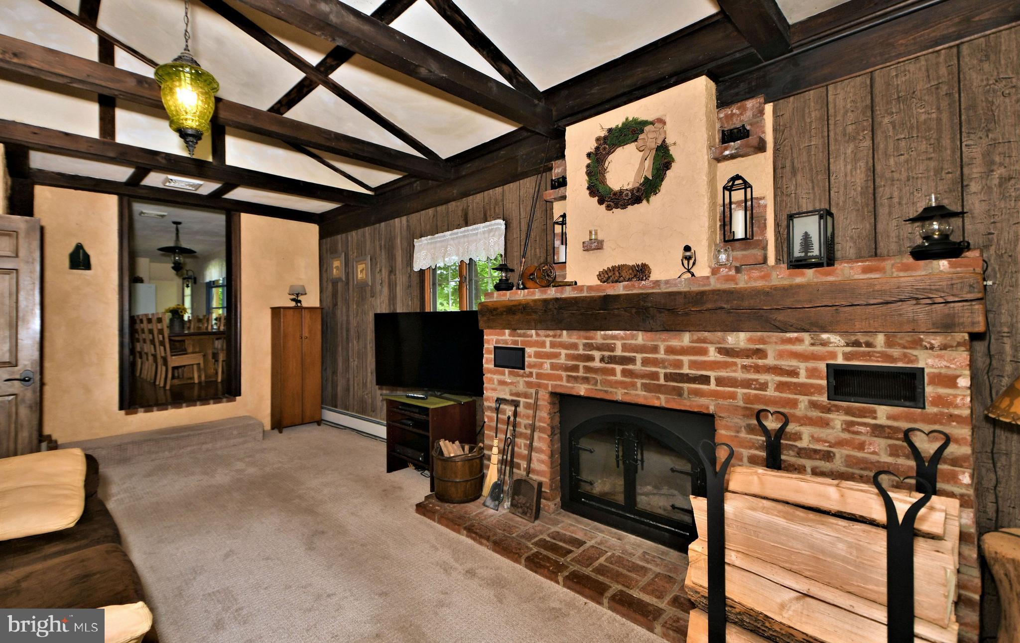 24 Moyer Road Telford, PA 18969 - Photo 16 of 62 a living room with furniture and a fireplace