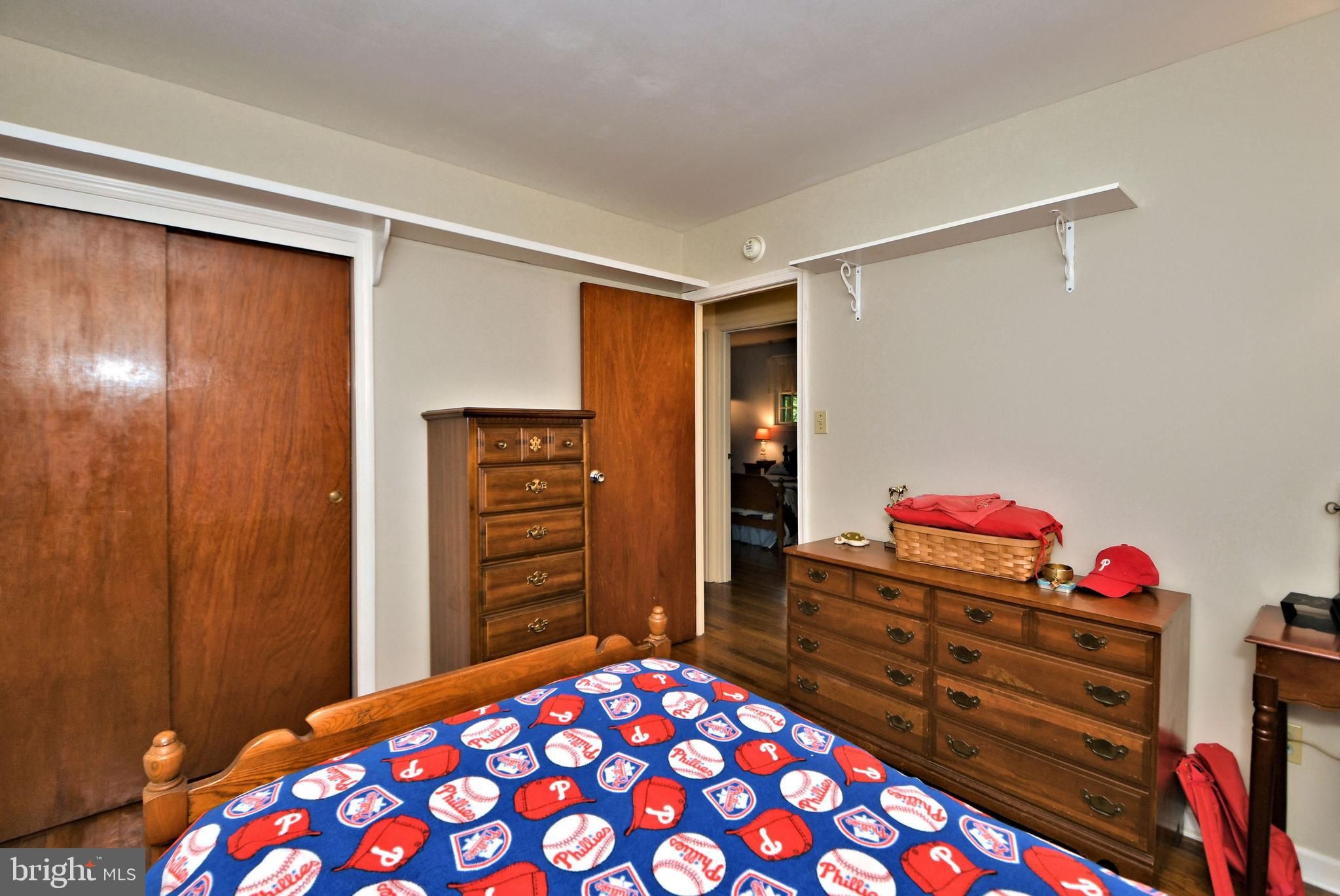 24 Moyer Road Telford, PA 18969 - Photo 20 of 62 a bedroom with a dresser and a chandelier